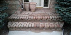 Complete grind out and brick replacement on step
