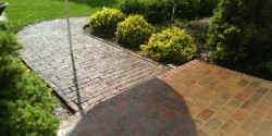 Complete grind out on stoop and removed and reset pavers on walkway