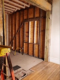 THIS WEEKS TOP PIC - Removed load bearing masonry wall. Set LVL beam to hold the load
